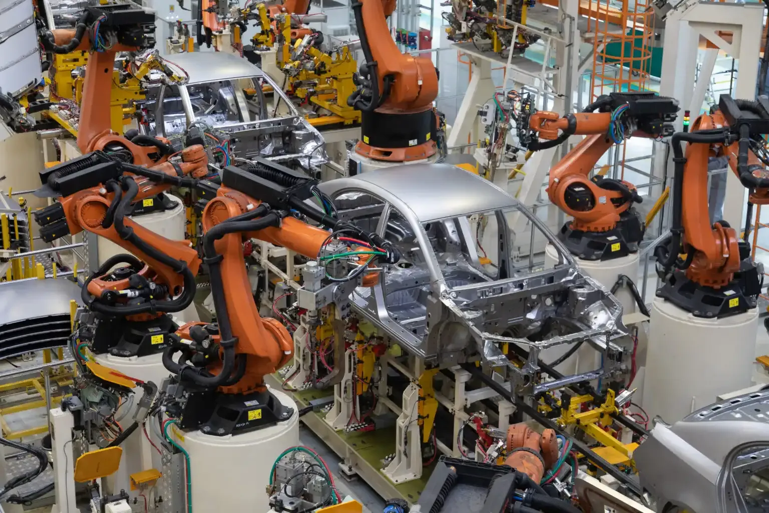 The Automotive Industry Shift: EVs, AI & Automation